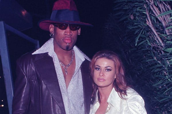 Image of Dennis Rodman with his wife Carmen Electra